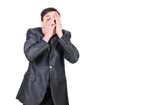 Terrified guy covering face against transparent background