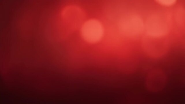 Abstract blurred red background with gradient and soft light spots