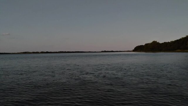 Serene Open Water at Dusk: Peaceful Twilight River Scene