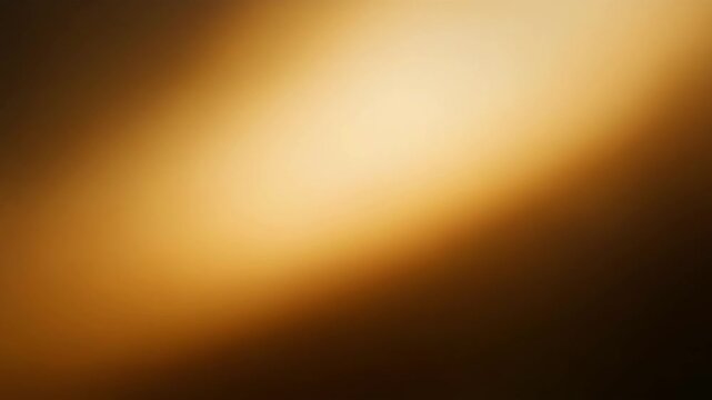 Abstract warm gradient background with brown and golden hues