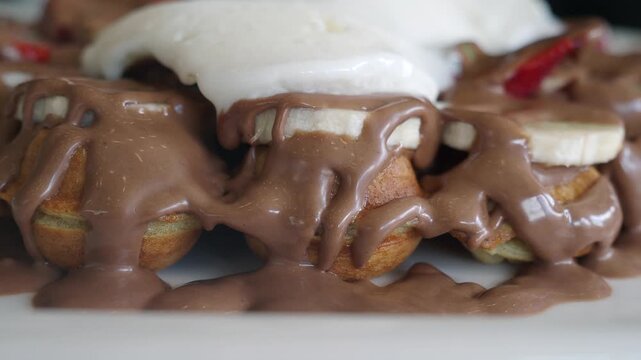banana and Nutella waffle on a plate