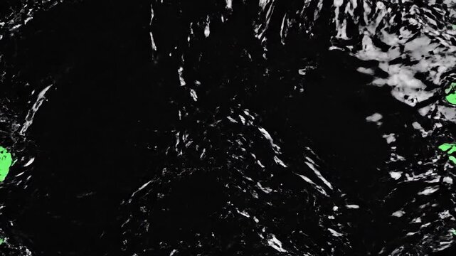 Black glossy liquid drips frame a bright green screen background