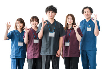 Obraz premium Doctors, caregivers, and chiropractors (men and women) wearing scrubs