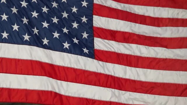 American flag waving in the wind: close-up of stars and stripes for patriotic, national, and political concepts png. ai generated