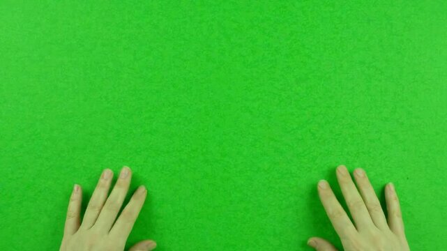 Green screen background, with human hands, entering frame for, chroma key compositing, and visual effects, projects png. ai generated