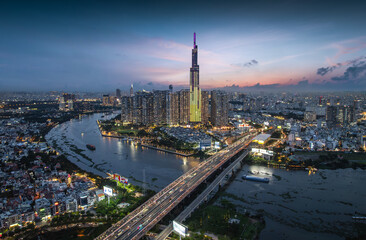 Fototapeta premium Aerial view of the skyline and nightscape of Ho Chi Minh City, Vietnam