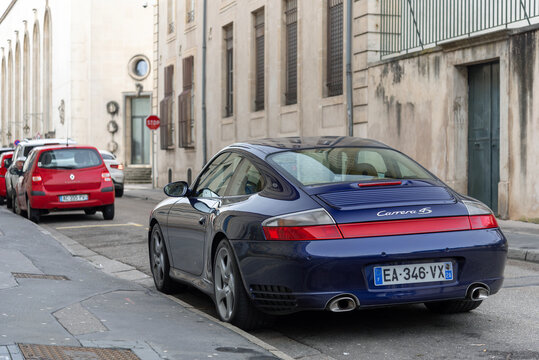 Nancy, France - March 2nd 2019 : View on a blue Porsche 996 Carrera 4S parked in a street.