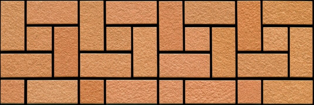 Geometric pattern of terracotta-colored bricks, offset and staggered