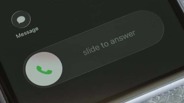 Incoming call on mobile phone close up macro video. Take or decline the phone call