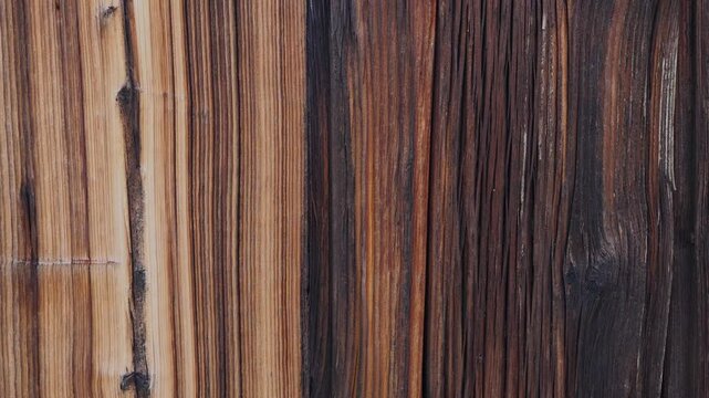 The chipboard material is stacked, a composite material made of wood with a porous edge and a multilayer structure in side lighting with a clear contour and an organic surface.