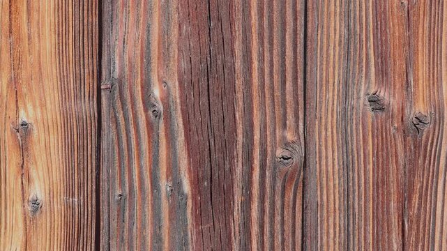 The chipboard material is stacked, a composite material made of wood with a porous edge and a multilayer structure in side lighting with a clear contour and an organic surface.