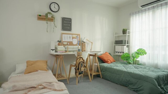 Modern university dormitory with two bed , study desks, chairs and furniture. 