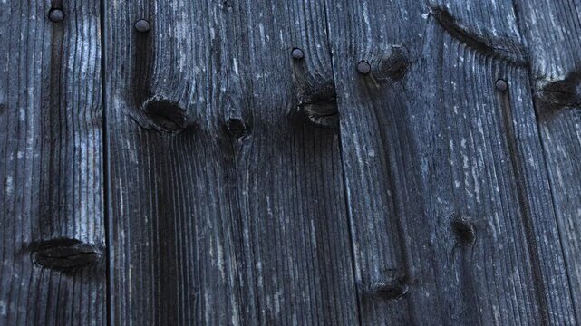 The chipboard material is stacked, a composite material made of wood with a porous edge and a multilayer structure in side lighting with a clear contour and an organic surface.