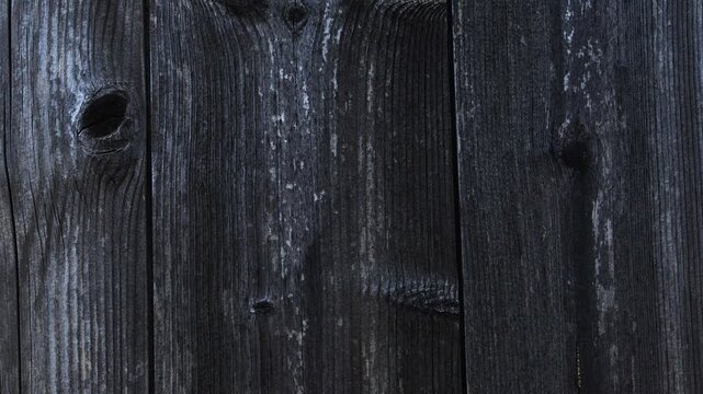 The chipboard material is stacked, a composite material made of wood with a porous edge and a multilayer structure in side lighting with a clear contour and an organic surface.