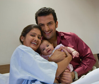 Couple with their child 