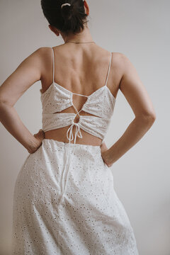 Back View of Model in White Dress. Aesthetic Summer Fashion