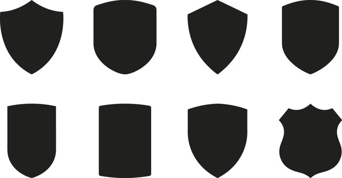 Collection of minimalist shield badge silhouette templates featuring blank heraldic emblem shapes for logo branding, security icons, vector design and protection