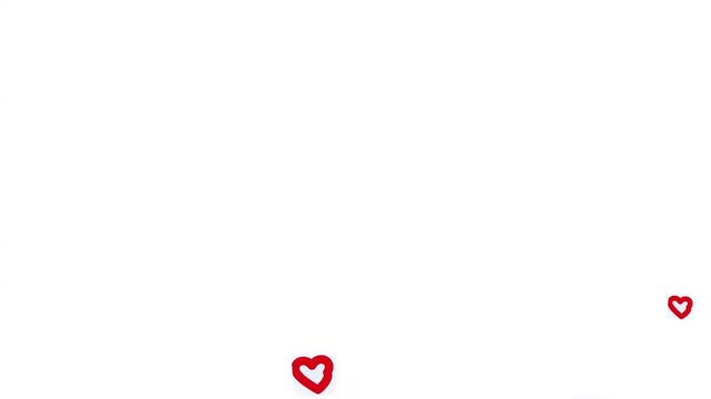 Animated red heart outlines floating upward