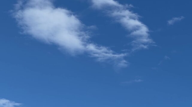 Cumulus generally refers to the puffy, white, cotton-like clouds with flat bases and rounded tops often seen on sunny days. in Waikiki, Honolulu, Oahu, Hawaii.