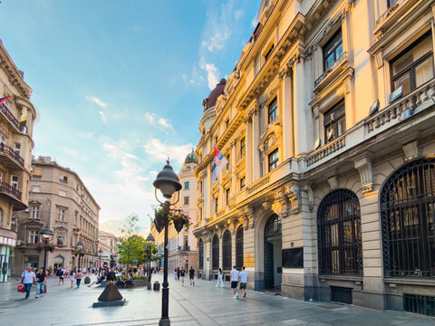 Pedestrians exploring historic Knez Mihailova Street in central Belgrade