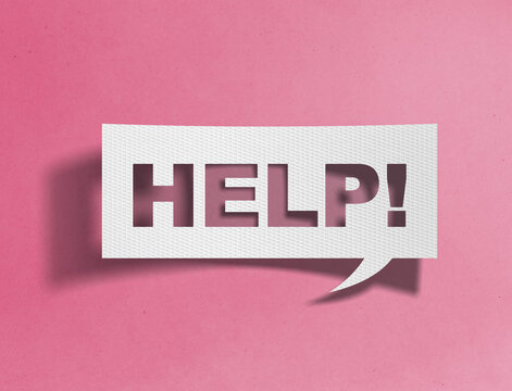 Paper speech bubble with help text cutout on pink background, support and assistance concept