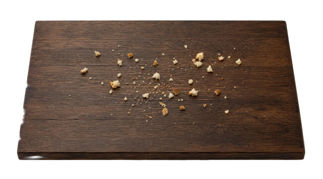 Artisanal bread crumbs on dark oak wood table