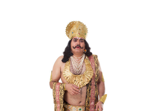 Man dressed as Raavan looking unhappy 