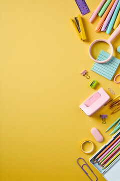 Vertical school supplies border on right side with copy space