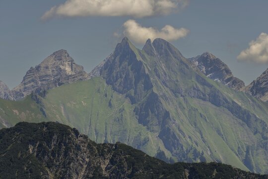 Summer in the Alps, mountain panorama from Fellhorn 2037 m, of the green grassy H&ouml;fats, 2259 m, Hochvogel in the back left, 2592 m, and on the right Kleiner Wilder, 2306 m, Allg&auml;u Alps, Bavaria, Germany