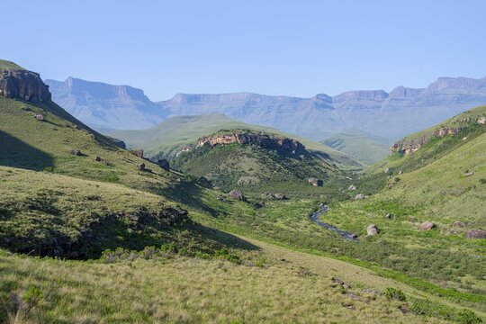 Green idyllic mountain valley with river, Giant's Castle, Maloti-Drakensberg Park, Drakensberg Mountains, South Africa