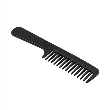 Black plastic hair comb on white background  