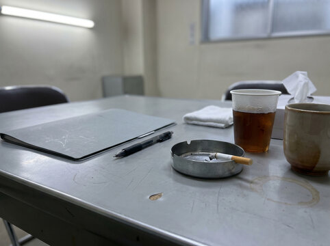 Police interrogation room detail close-up macro composition photorealistic empty documentary