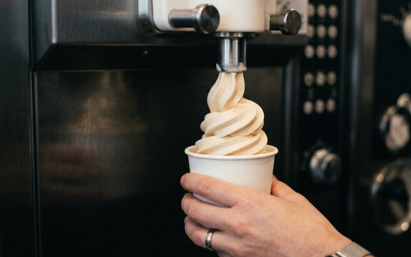 Food photography highlights the detailed soft serve ice cream with an irresistible appearance.