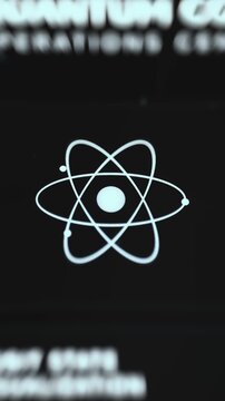 Atom Mark Glowing Between Blurred Headlines On An Interface