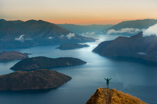 New Zealand, South Island, Wanaka, Otago, Woman on Coromandel peak at sunrise