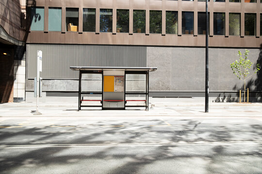 UK, England, London, Bus stop on empty street