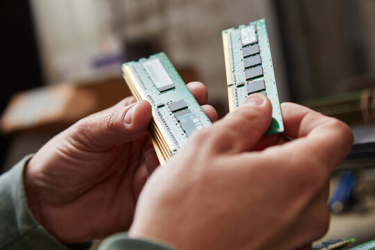 Hand holding used RAM