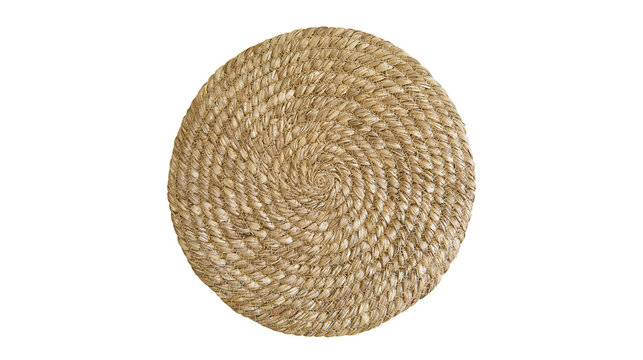 Round woven straw placemat with spiral pattern