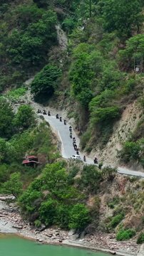 Vertical Aerial View of Bikers Riding Along Chamera Lake Road, Himachal Pradesh