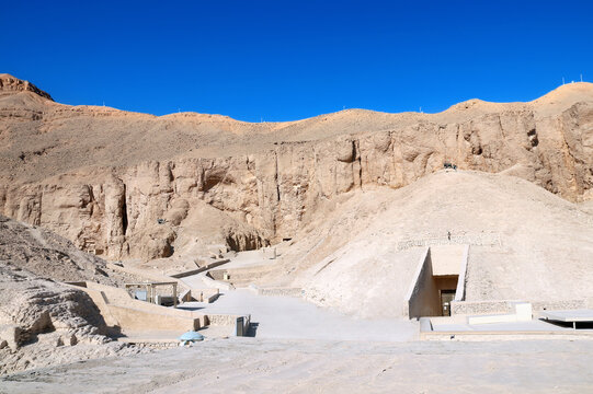 Entrance to the tomb of the pharaoh in Valley of Kings, Luxor, Egypt. View of Theban Necropolis, Luxor, Egypt. Topic of vacation, travel, trip abroad on vacation, cruises and tours