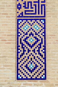 An example of Uzbek tile art featuring geometric and floral motifs. The interior and exterior walls of historical buildings in Uzbekistan are adorned with tiles.