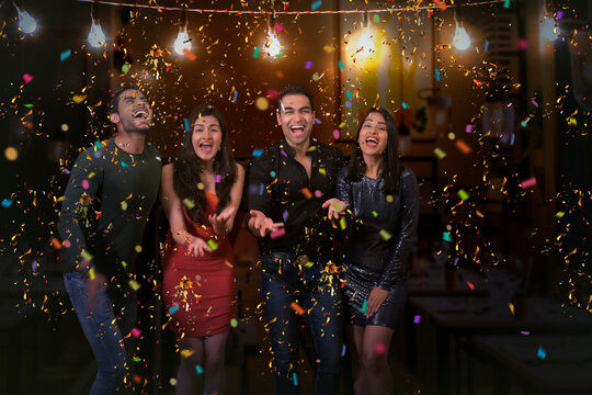 Group of friends partying together on new year�s eve. 