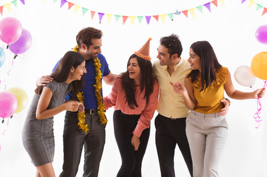 Friends having fun together at a party. 
