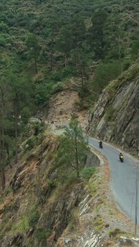 Vertical Aerial View of Bikers Riding Along Chamera Lake Road, Himachal Pradesh