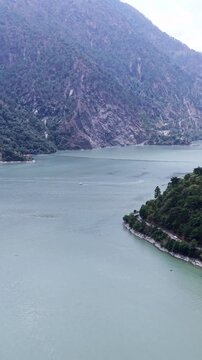 Vertical Aerial View of Chamera Lake with Speedboat, Himachal Pradesh, India