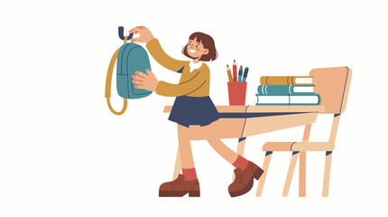 Fototapeta premium A happy schoolgirl standing by her desk preparing her backpack for classes in a classroom setting.