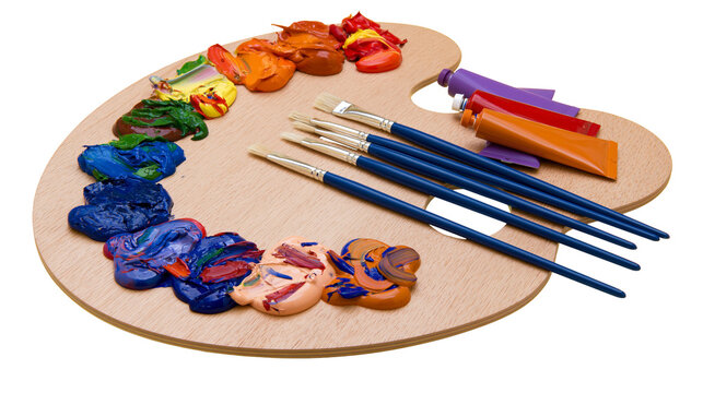 Artist s wooden palette with colorful oil paints and brushes