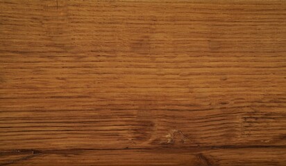 Naklejka premium Natural brown oak wood grain texture background for interior design and rustic furniture surfaces