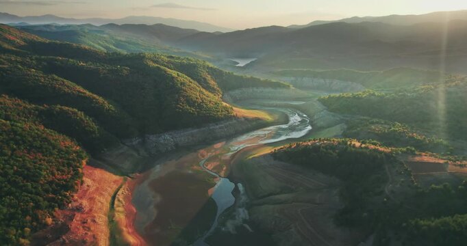 Draught Empty Riverbed Lake Dam at Sunset Aerial View