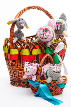 Knitted wool cats and dogs on a white background